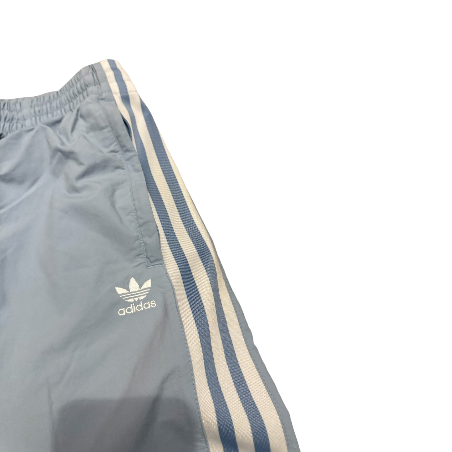 Spodnie Adidas dresowe ortalionowe niebieskie z ściągaczami